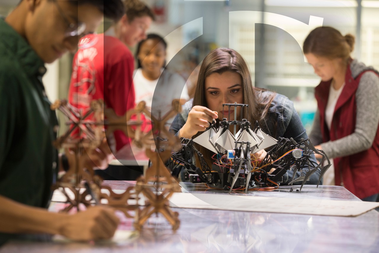 A DAAP student constructs a model