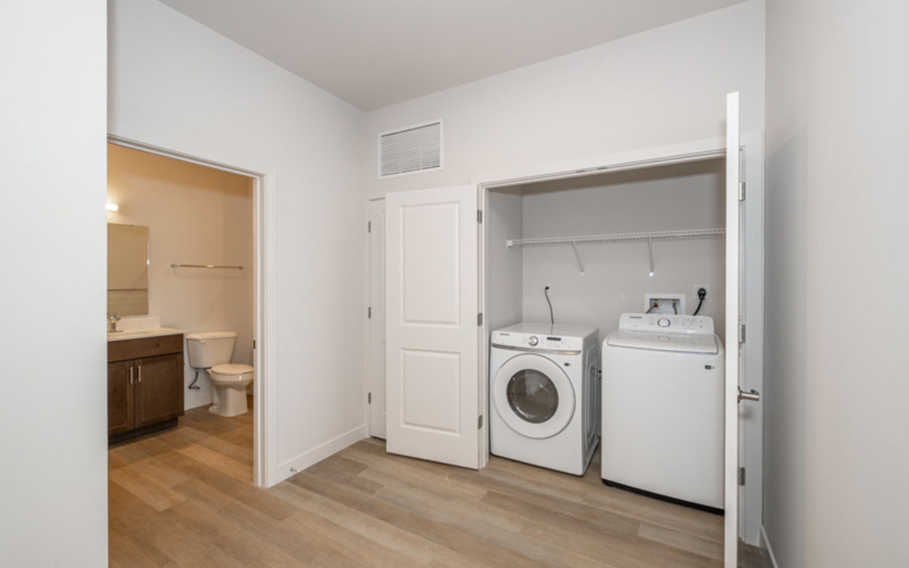 Laundry closet with full size washer and dryer