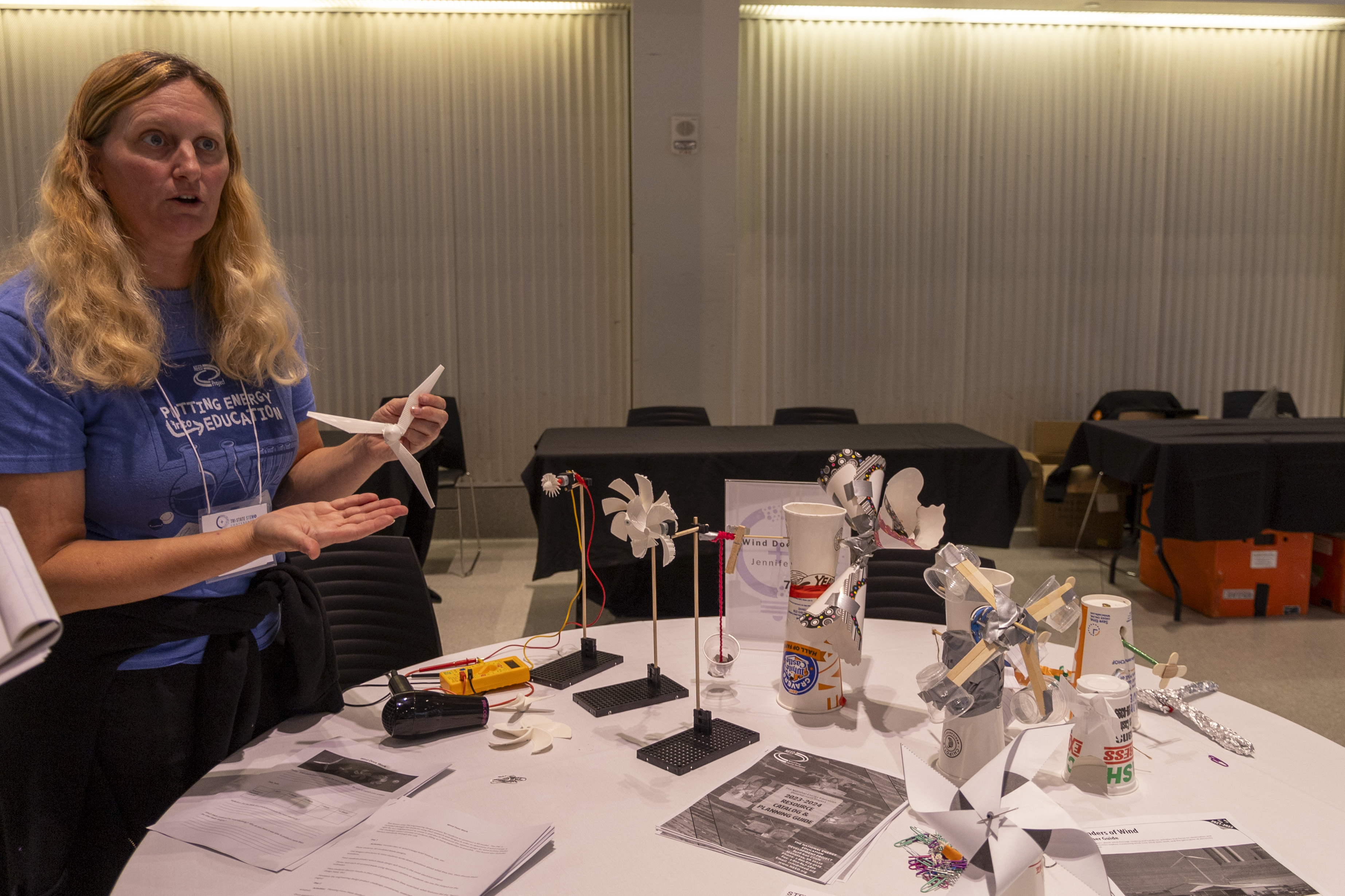 Educators present their STEM+ projects for the audience around the TUC Great Hall.