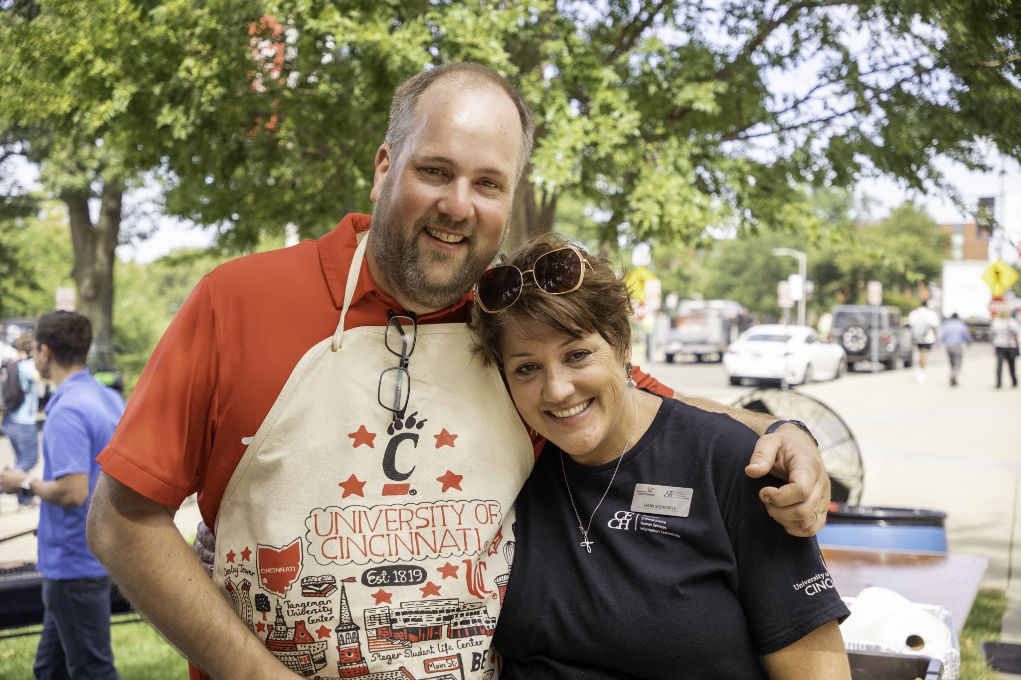 Attendees enjoy the 24th CECH Welcome Back BBQ in the Teacher's-Dyer Complex Courtyard.