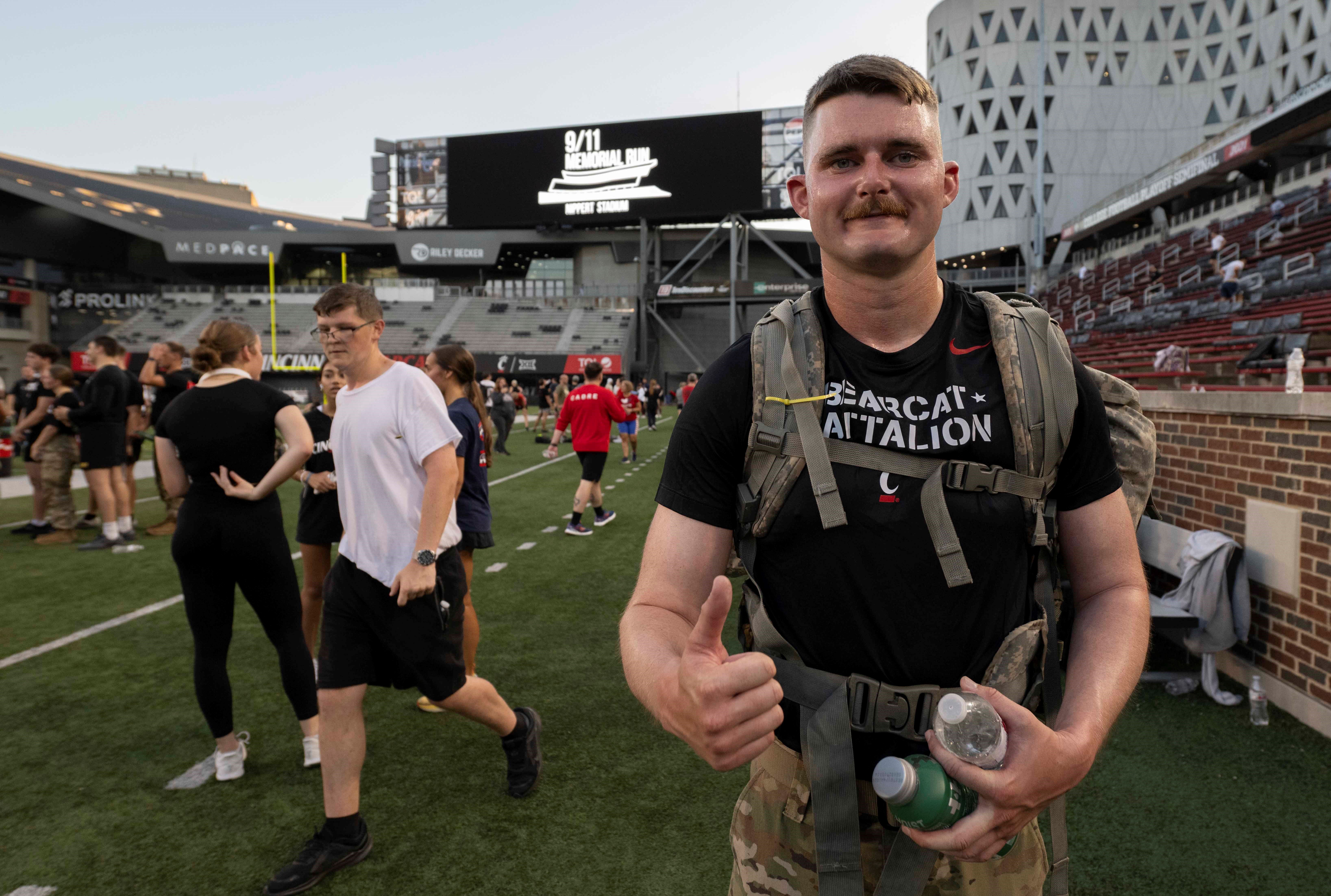 ROTC cadet Zane Mustard giving a thumbs up after the run. 