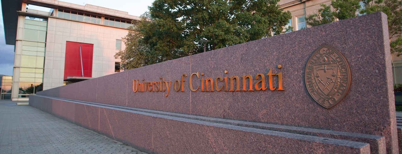 University sign shot with evening light