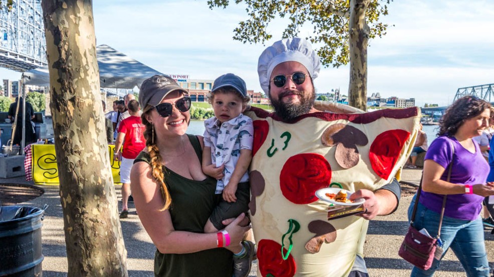 man in a pizza costume