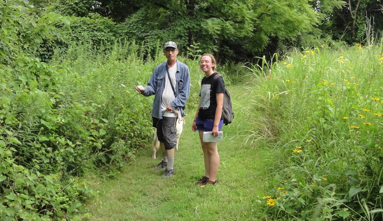 UC professor Denis Conover and UC student Bridget Taylor conduct fieldwork on invasive species.
