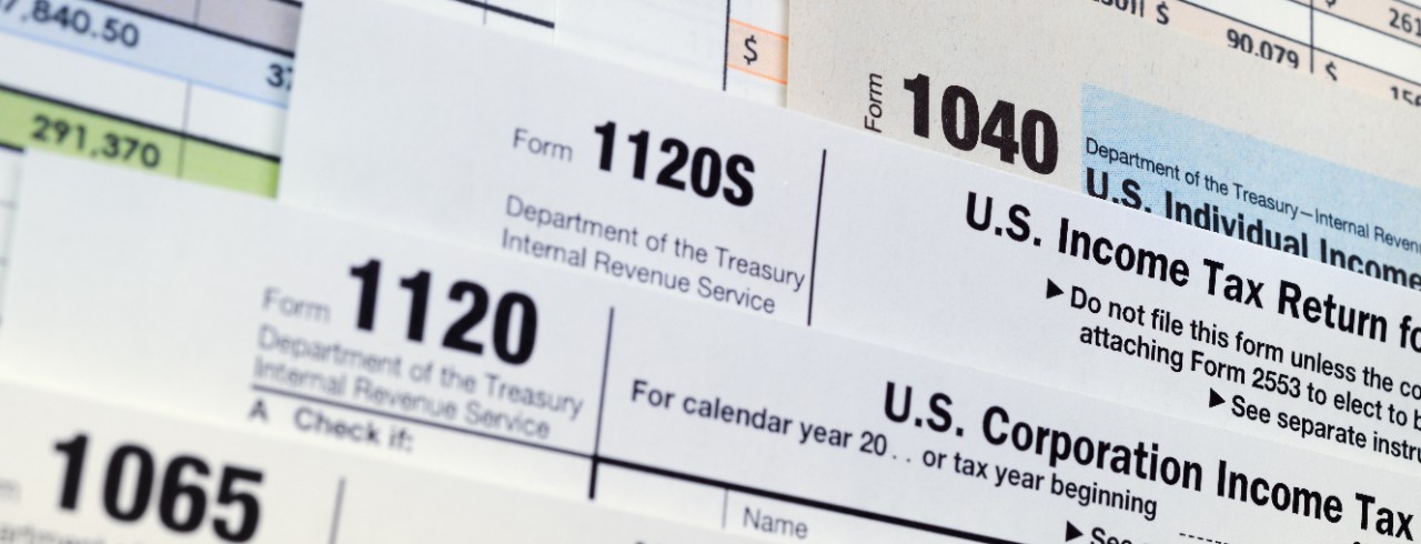 A stock image of various U.S. tax forms.