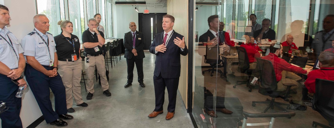 Craig Baker, program administrator for the Ohio Cyber Reserve, explains how members of the Ohio Cyber Reserve respond to cyberattacks during a cybersecurity exercise at UC Digital Futures.