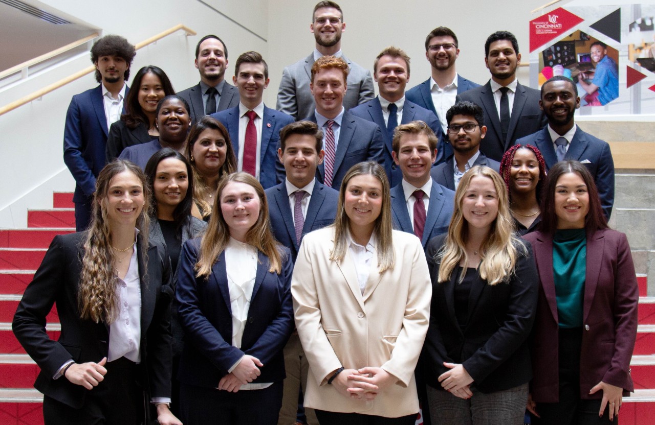 Lindner's full-time MBA class of 2024 in professional dress in Lindner Hall.