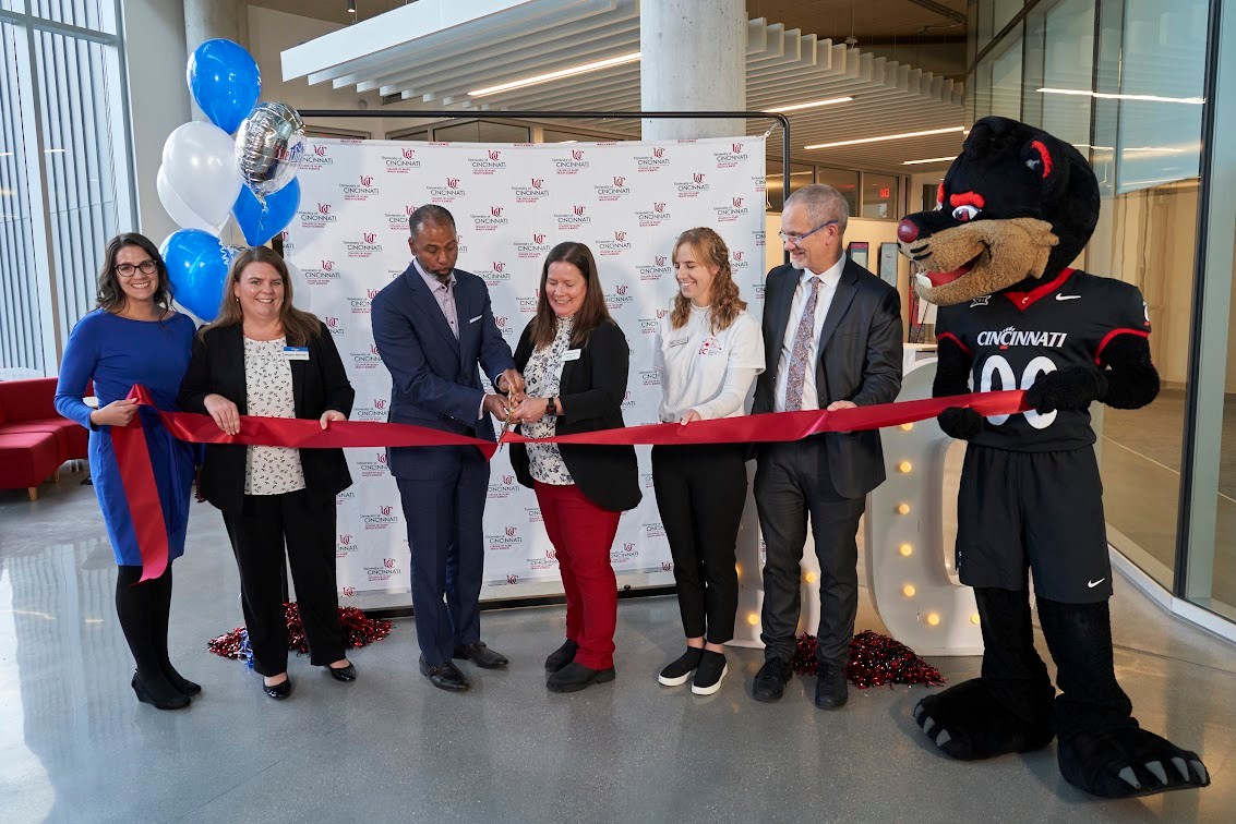Individuals from UC and Kroger cut the Ribbon 