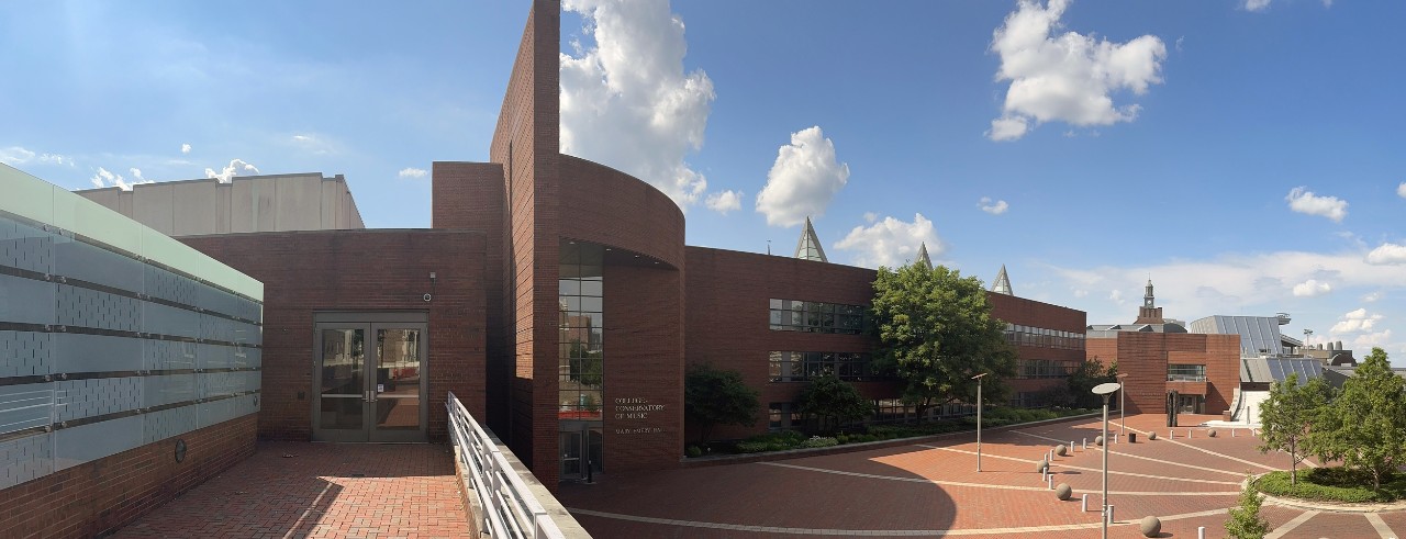 A May 2024 panoramic photograph of CCM's Corbett Center for the Performing Arts and Mary Emery Hall. Photo/Curt Whitacre