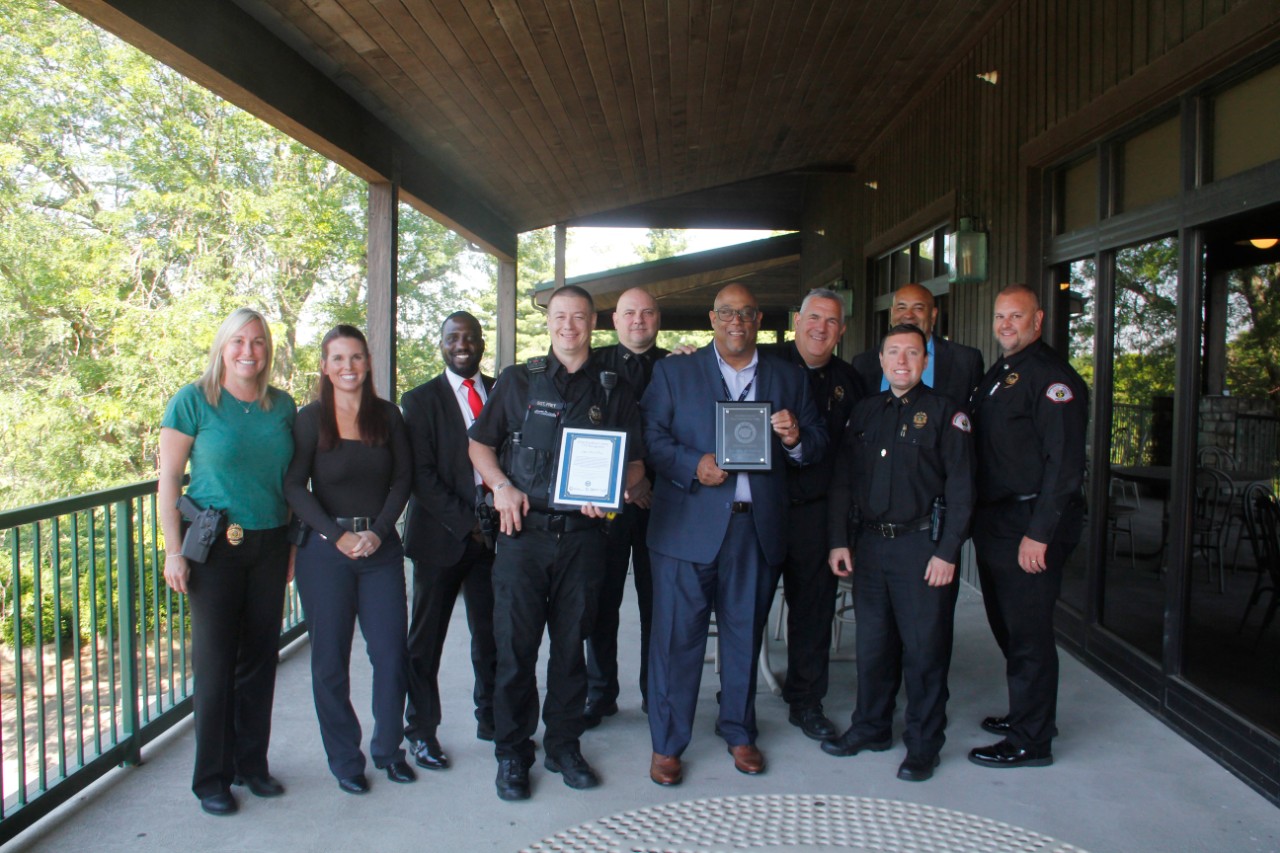 Members of UC Police pose with the CIT Department of the Year award.