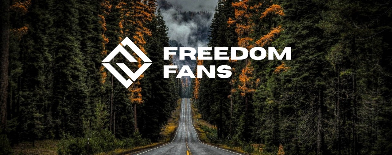 Freedom Fans logo features a road stretching off in the distance surrounded by evergreens and the company name with a logo of interlocking squares.