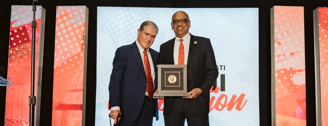 Dean Kereiakes receiving the William Howard Taft Medal of Honor from UC President Neville Pinto