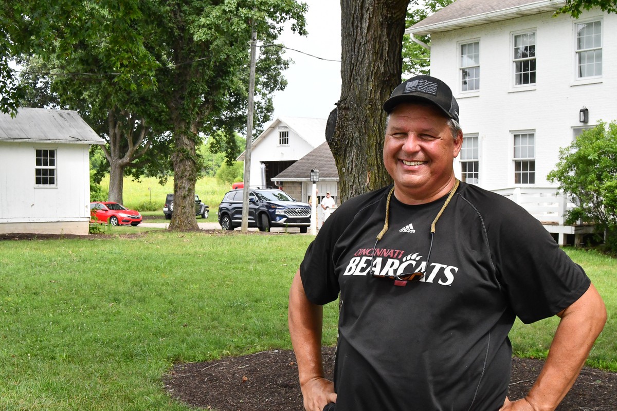 Ken Petren poses in front of the historic buildings at UC's Center for Field Studies.
