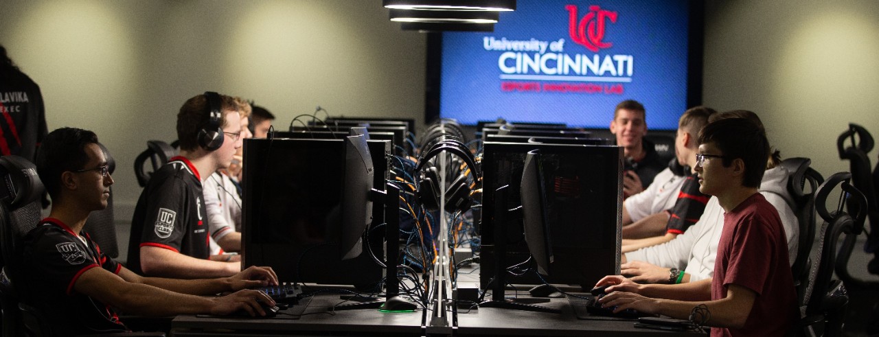 Students play video games in the UC Esports Innovation Lab.