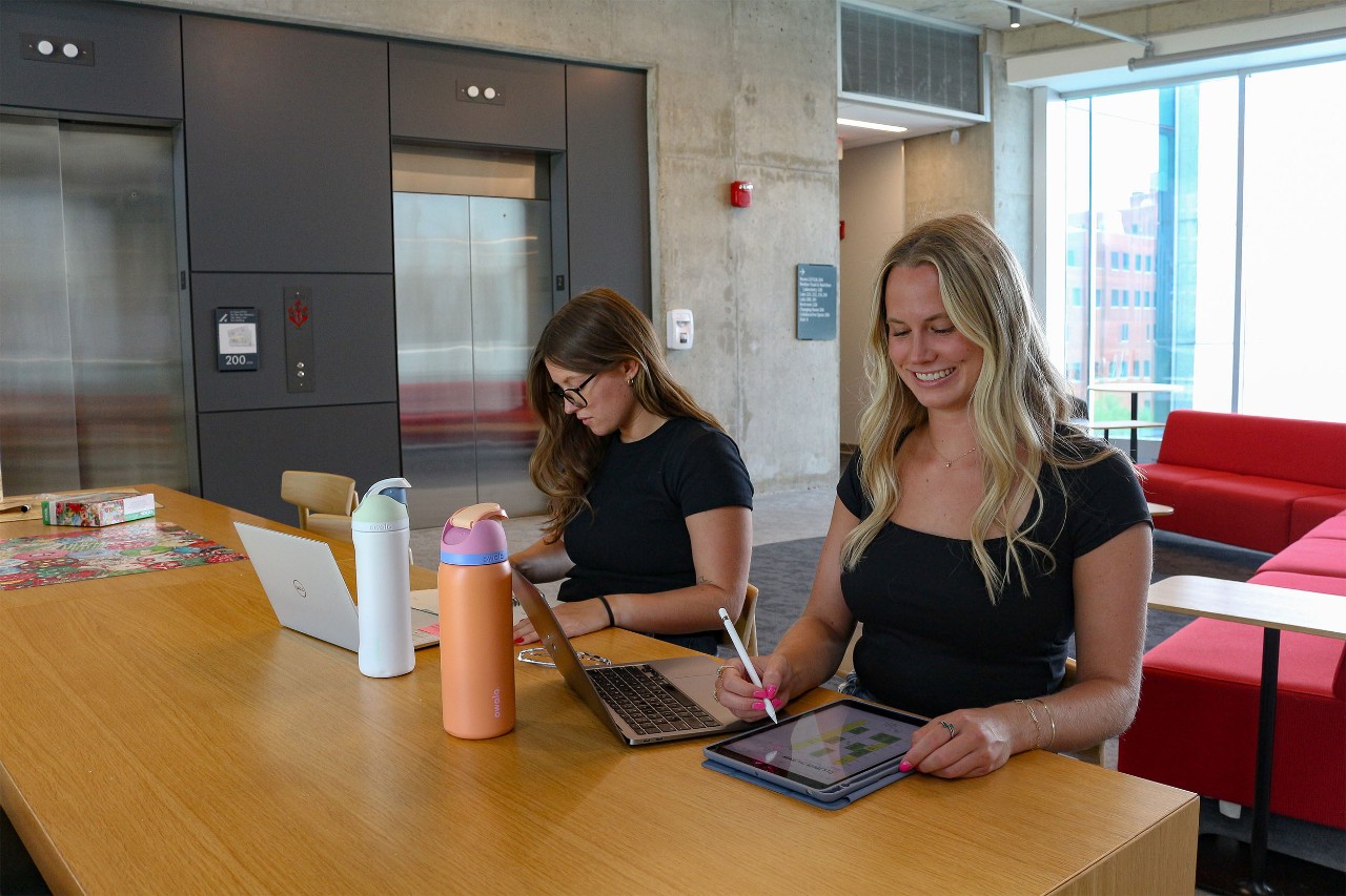 Emily and Olivia studying in the Health Sciences Building