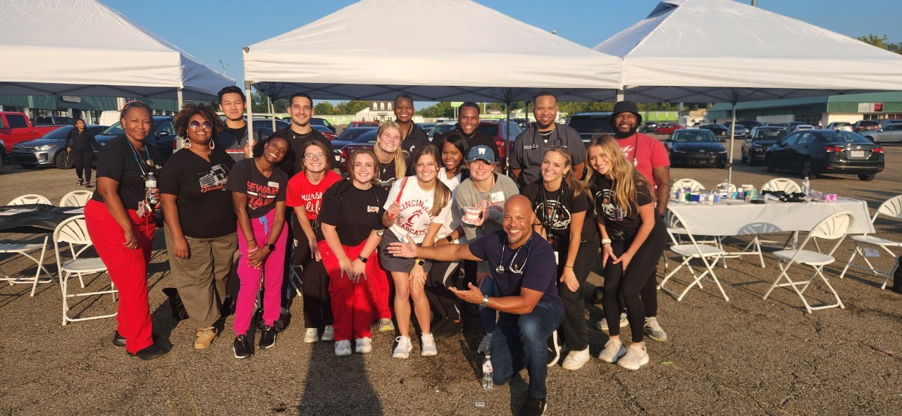 Chris Lewis with medical volunteers.