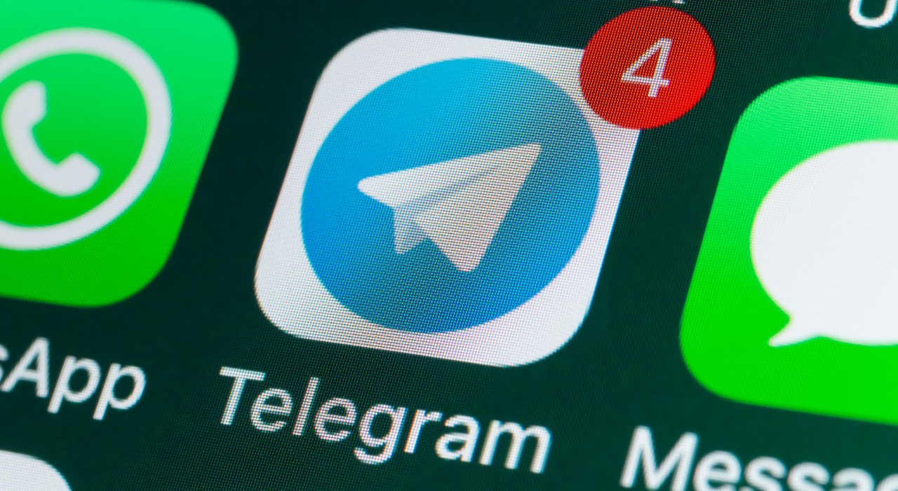 Telegram's app logo on a phone.