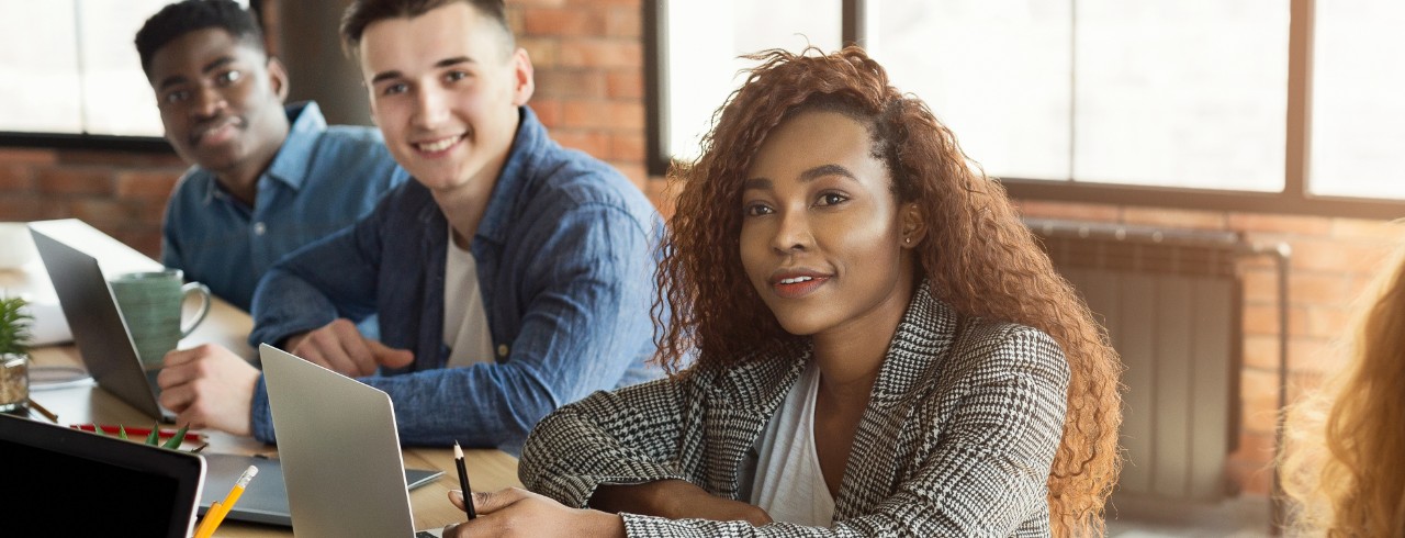 Young entrepreneurs sitting at a table