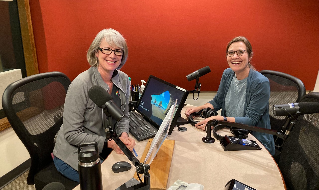 Lucy May and Theresa Culley sit in the WVXU radio studio.