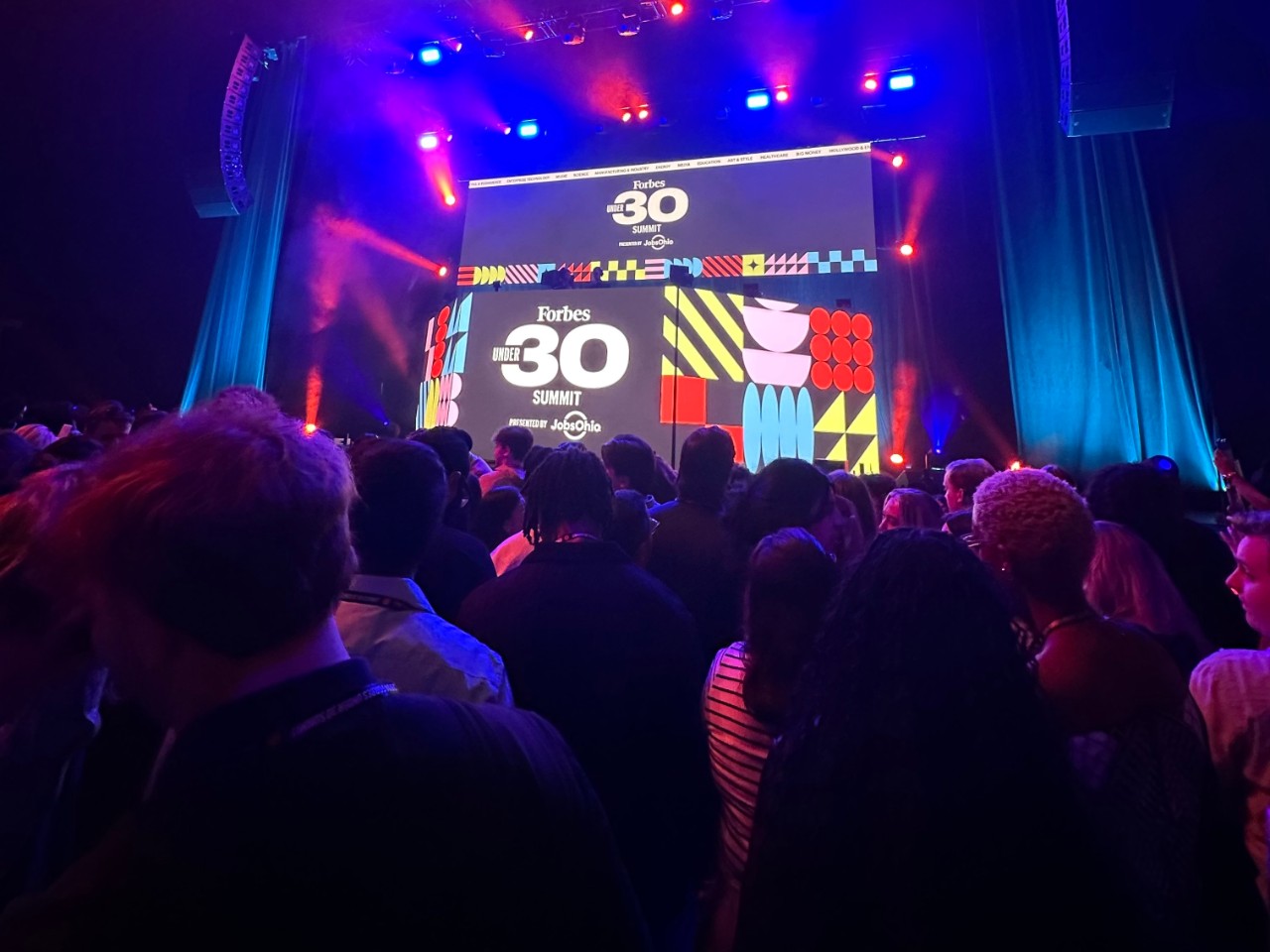 Attendees at an event during the Forbes Under 30 Summit.