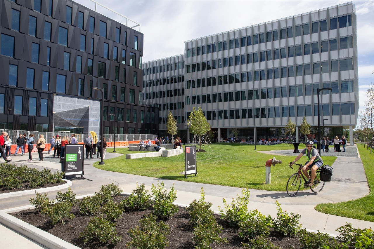 Digital Futures Buildings with people walking in front of them.