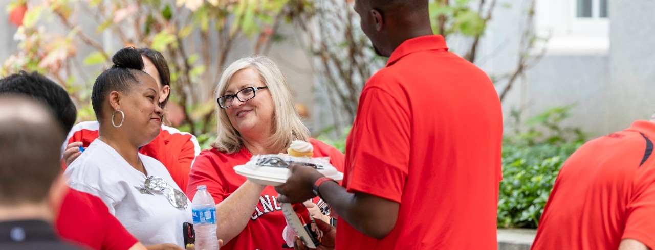 CECH Dean Lisa Huffman and Assistant Dean Teneisha Dyer converse during the annual CECH Welcome Back Barbecue. 