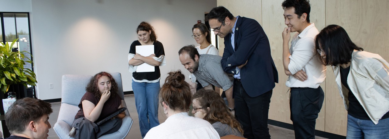 The NEXT Innovation Scholars explain their first iteration of the final prototype to the judges. Photo Credit: UC student Grace Nunn