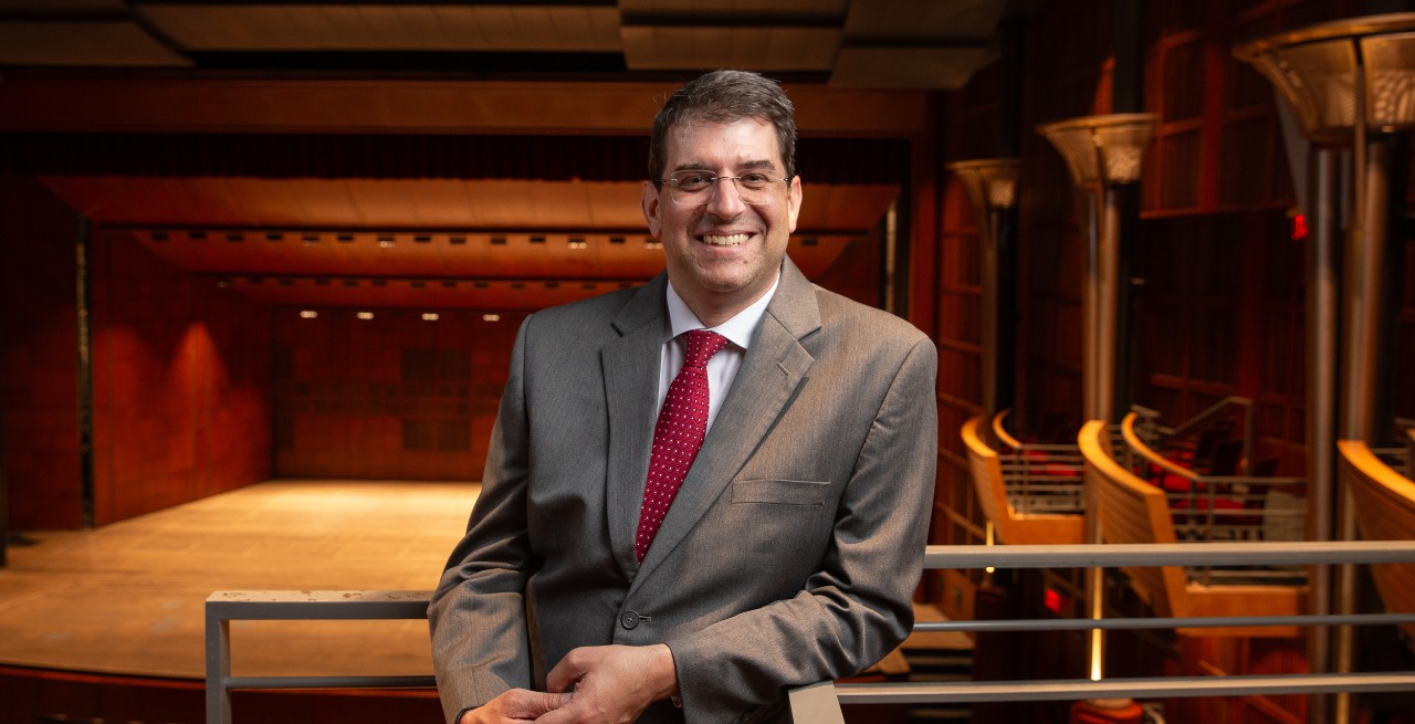 A portrait of new CCM Dean Pete Jutras in Corbett Auditorium. Photo/Andrew Higley/UC Marketing + Brand.