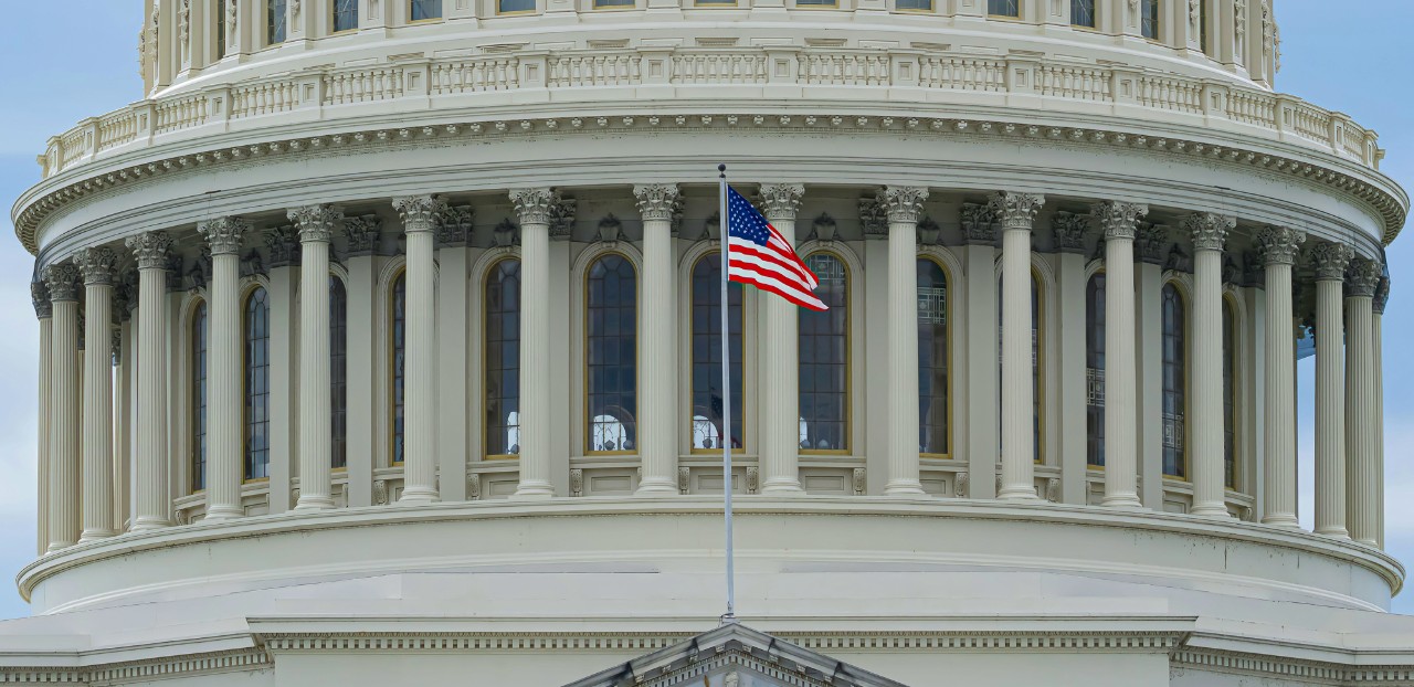 Closeup of the American flag flying at the U.S. Capitol.