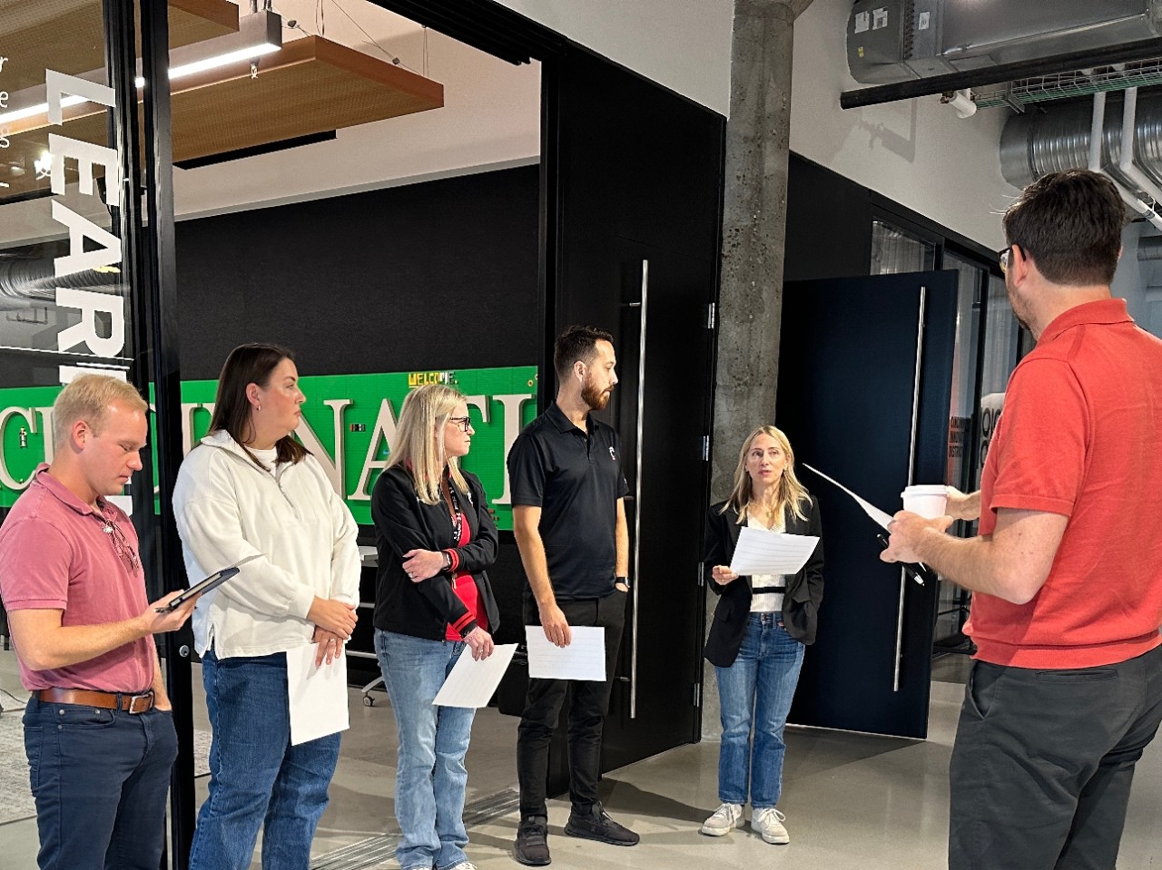 Learning Lab Director Nicholas Partridge leads Corryville CDC members outside of the Learning Lab