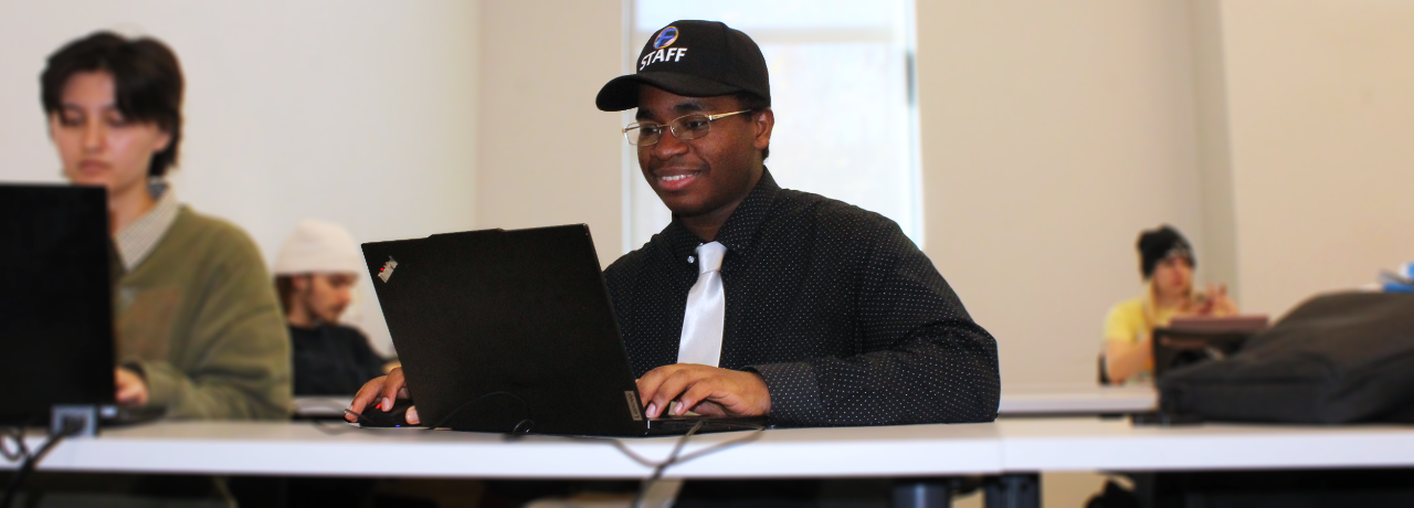 Daniel Ruff in front of laptop