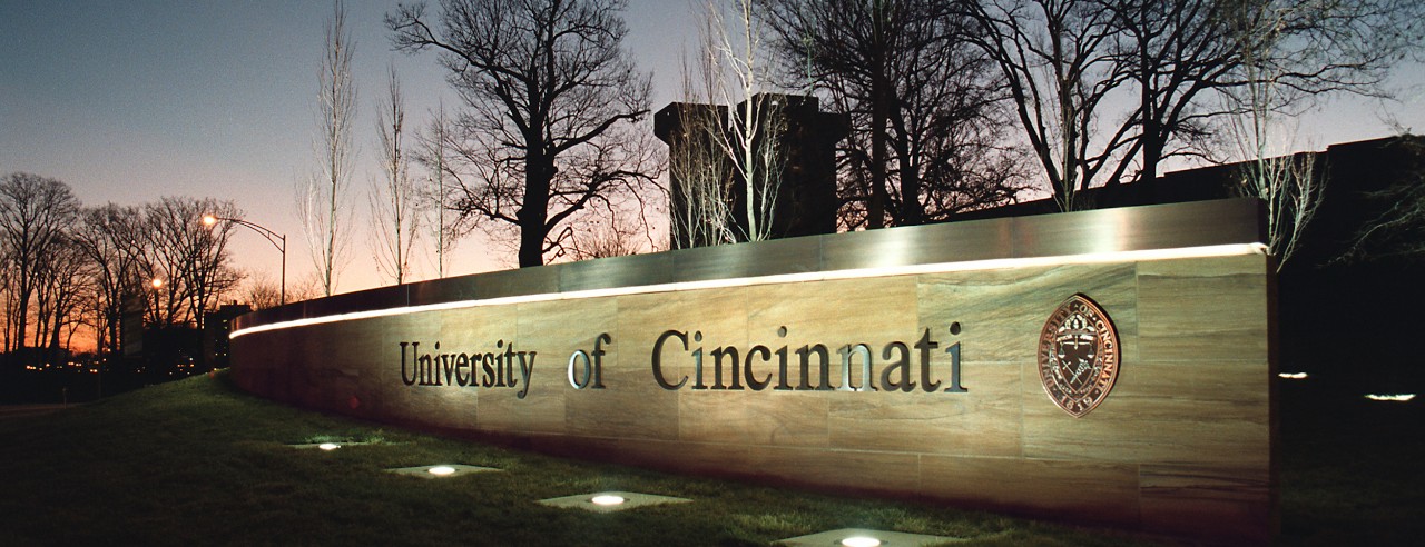 University of Cincinnati illuminated sign at night.