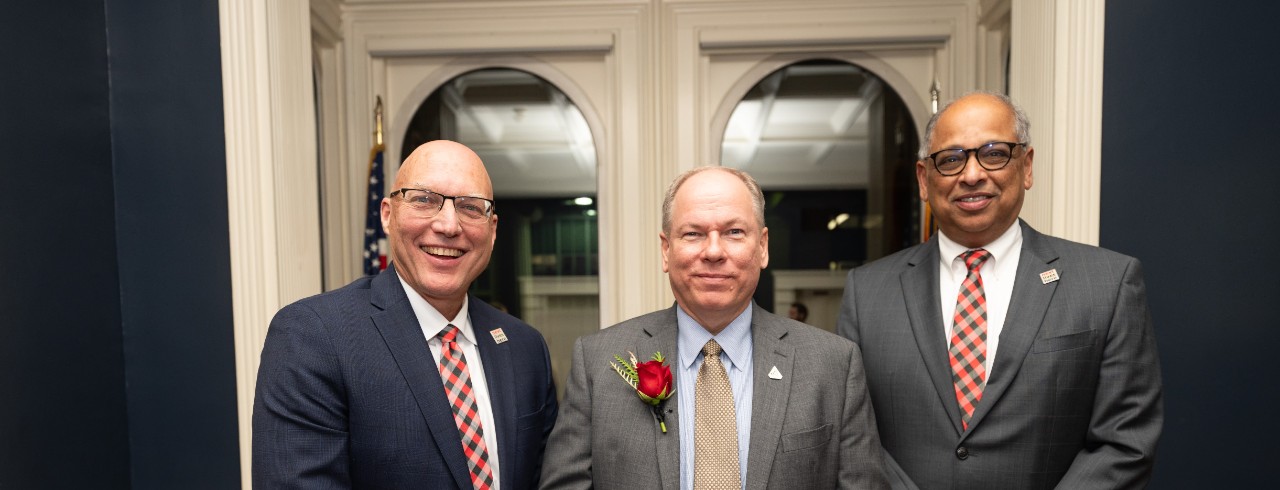 CEAS Dean John Weidner (left) with alumni awardee John McCullough (center) and UC President Neville Pinto (right), at the CEAS alumni awards dinner