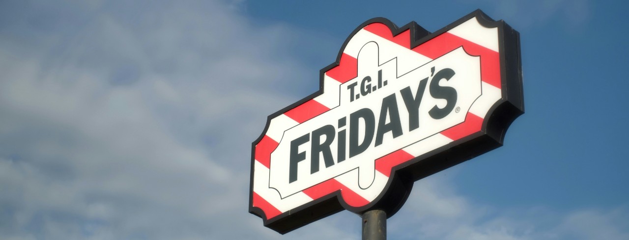 TGI Fridays sign with the sky in the background.