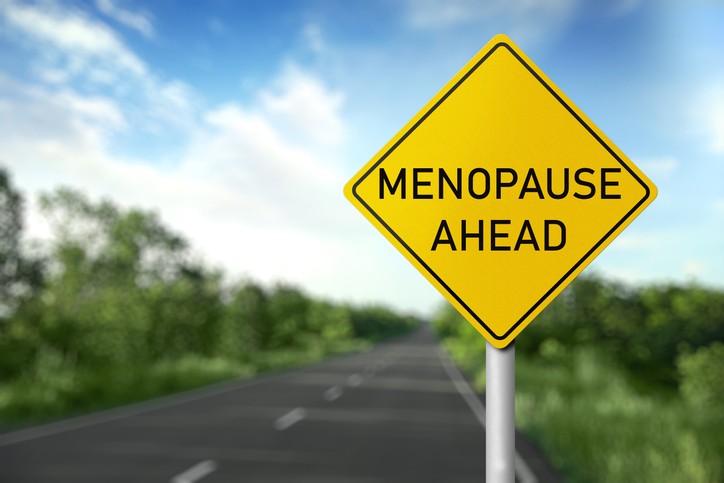 Illustration of menopause road sign