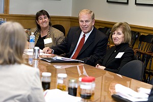 Graduate student Nancy Dendramis explains biodiesels to Governor Strickland, flanked by UC's Sandra Degen and Dorothy Air.