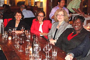 Deborah Hampton (far right) meets with fellow trademark colleagues.