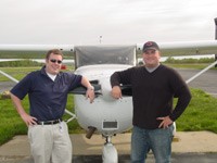 Brian Renn (right) with instructor Bryan Watson immediately following his solo flight.