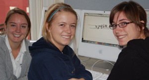 UC's Lisa Bambach, at right, working with Saint Urusula students on a project for the Starling Project Foundation.