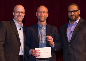 Eugene Rutz (middle) receiving the Sonic Foundry 2013 Rich Media Impact Award on behalf of UC.