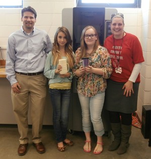 From left to right: Mr. Antoline, Sophia Spiegel, Maddy McCall, and Principal Durham.