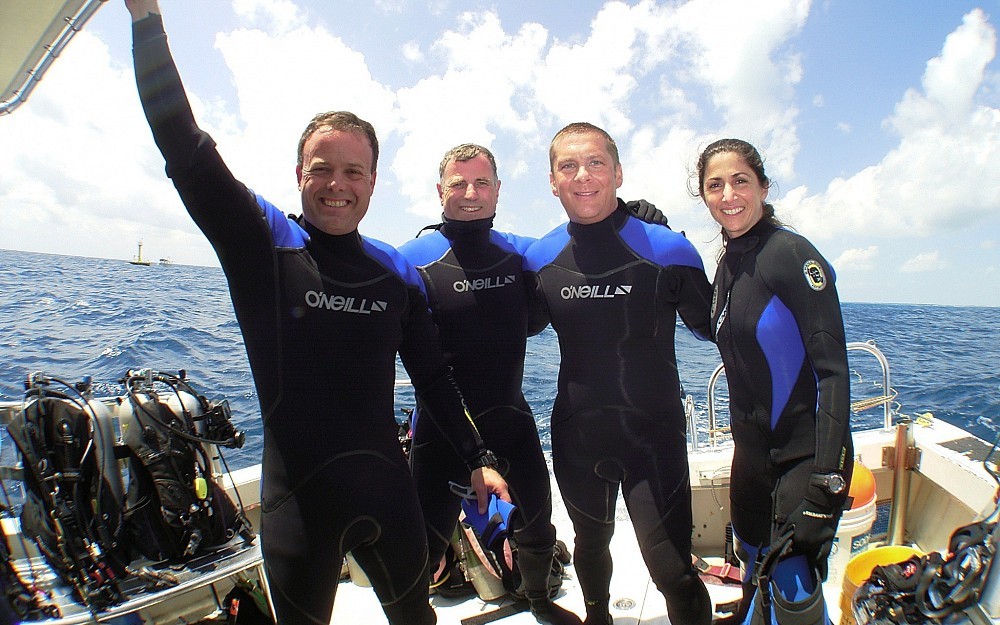 Dr. Tim Broderick (second from right) "splashed down" as part of the NASA NEEMO-9 research in April 2006. 