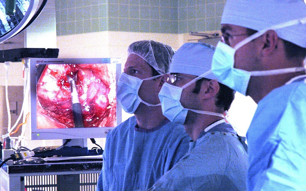 Bradley Davis, MD, (far left) and his team perform laparoscopy at Christ Hospital.