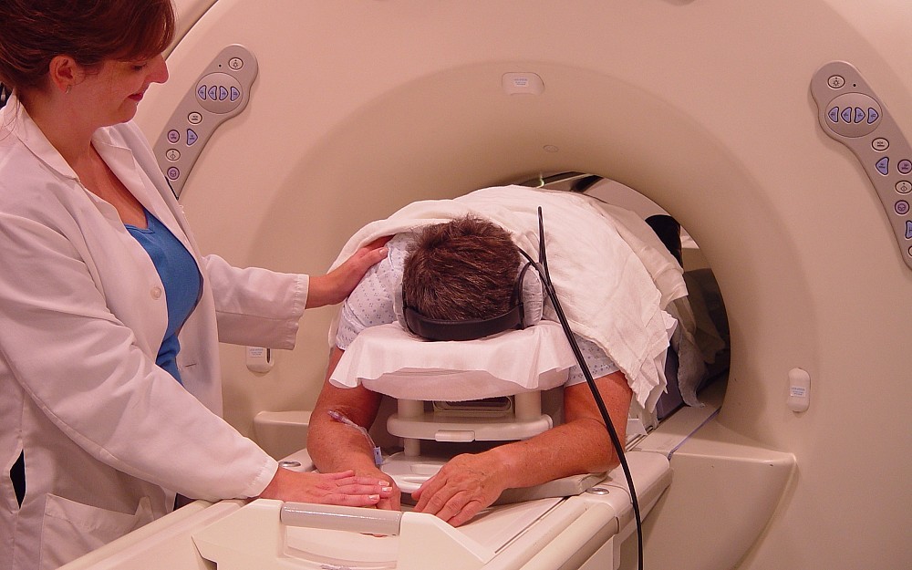 A patient has an magnetic resonance imaging scan to identify signs of breast cancer. 