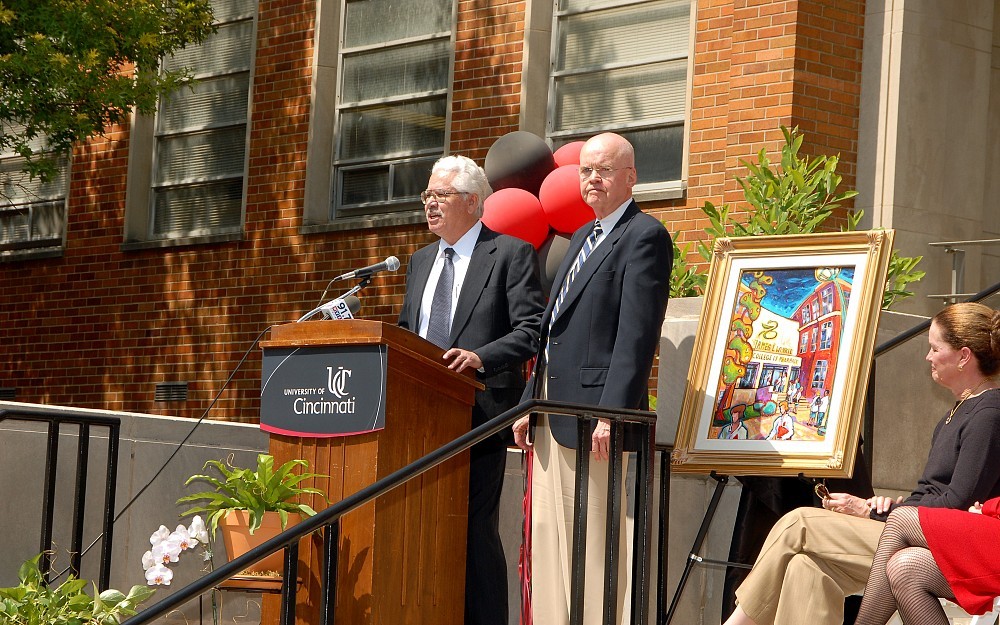 Daniel Acosta (left), PhD, dean for the College of Pharmacy, thanks $10 million donor James Winkle for his gift. The college has been renamed the James L. Winkle College of Pharmacy.