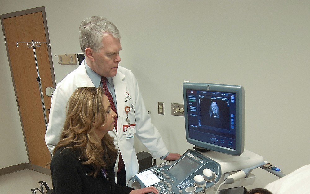 Dr. Evans and a ultrasound technician test new equipment