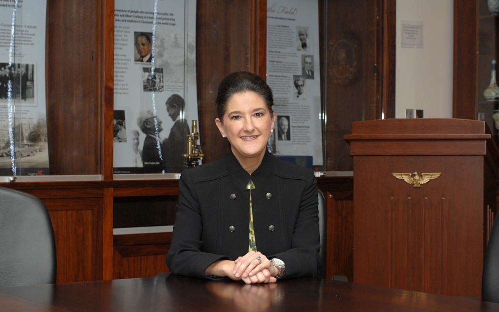 Rita Alloway, PharmD, in the Stanley J. Lucas, MD, Board Room on UC's medical campus.