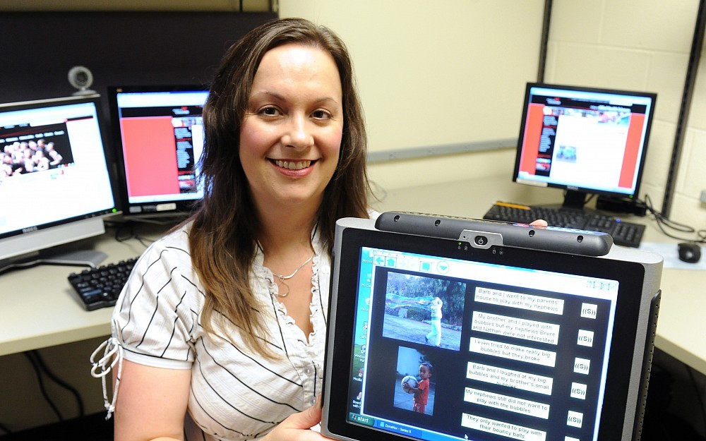 Aimee Dietz, PhD, a research in the UC Department of Communication Sciences and Disorders, is studying the use of assistive communication devices for patients with aphasia.