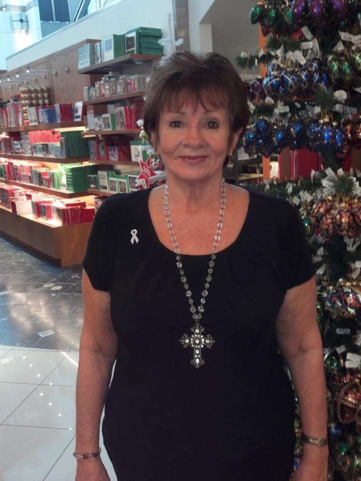 Thanks to treatment by UC Health doctors, Sharon Rothan has her pulmonary hypertension under control and can live a normal life. She's pictured here during her shift at Macy's department store.